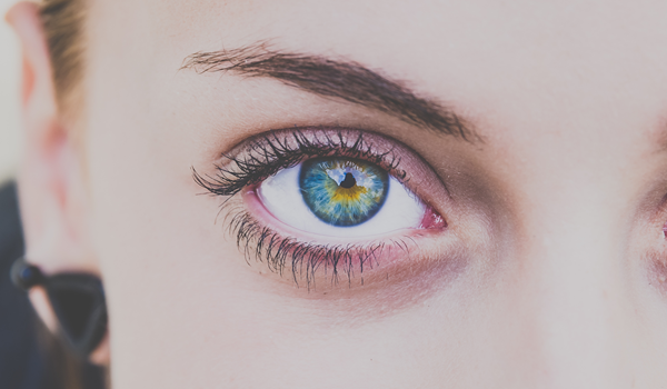 a close up of a woman's eye